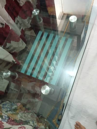 Glass table with Wooden sofa chairs