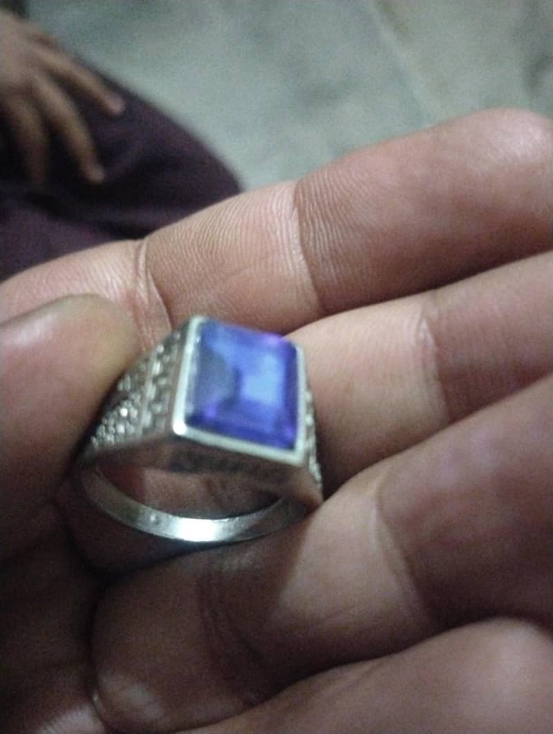 silver ring with ruby blue stone 0