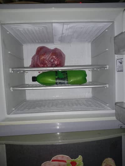 Dawlance 2 door medium size urgent for sale