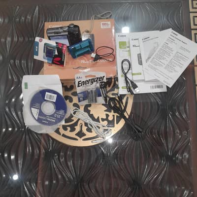 MINT/BOXED Canon PowerShot A1000 IS – Barely Used (Collector's Piece)