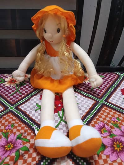 Doll in orange color