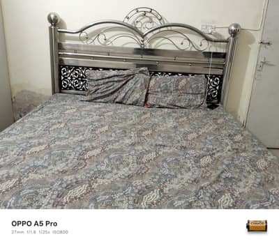Steel bed with mattress