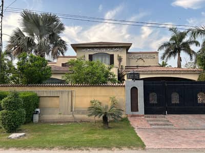 CORNER SPANISH DESIGN 2-KANAL ELEGANT AND FULLY MAINTAINED SUPER HOT LOCATED BUNGALOW IS AVAILABLE IN THE BEST BLOCK OF DHA LAHORE.