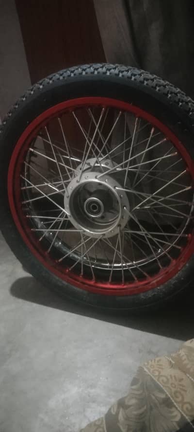 Honda 70 brand new rim with brand new tire and shoks