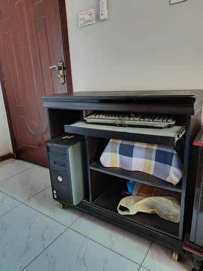 Wooden PC table with good rubber wheels Price is negotiable