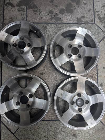 13 Inch rims in good condition with a repairable crack in one