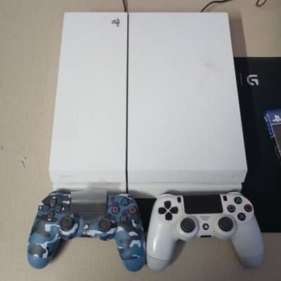 PS4 with Accessories + Games – Urgent Sale
