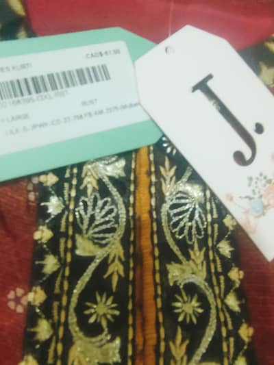 new. branded J dot shirt size. xl  inner attached. laces.