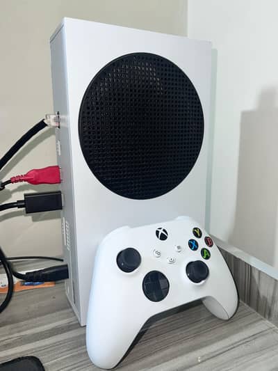 X box series S and a bloody gaming mouse