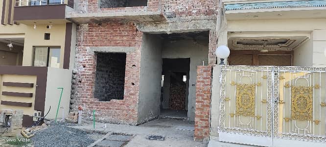 3 Marla Grey structure House for sale Prime location of E block  Near to main boulevard, near to School , near to masjid.