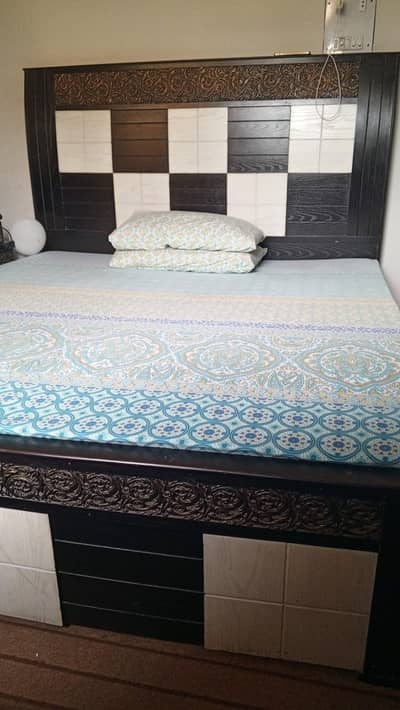 Modern Dual-Tone Wooden Bed with Intricate Hand-Carved Scrollwork