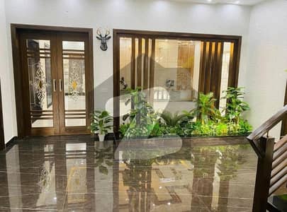 A BEAUTIFUL 1 KANAL SINGLE STOREY HOUSE FOR RENT IN OVS B BAHRIA TOWN LAHORE