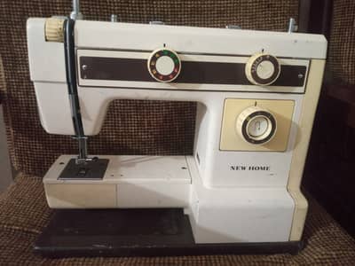 Genom sewing machine model 657A. made in Tiwan.