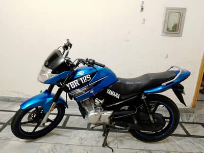 one hand use YBR 125