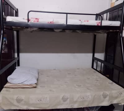 Stylish black bunk bed with a modern, space-saving design