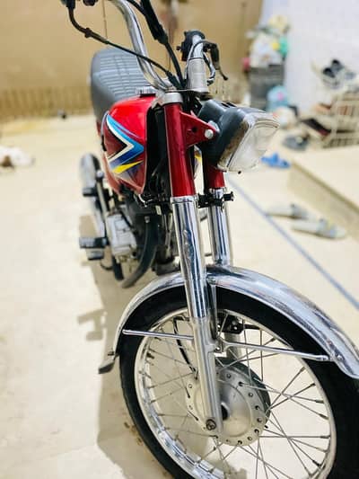 selling my Honda 125 karachi number documents clear