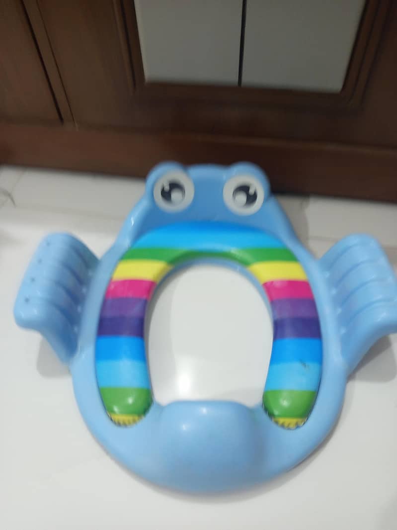 Swing and commode seat for baby 3