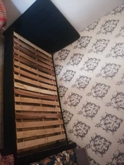 Wooden black bed