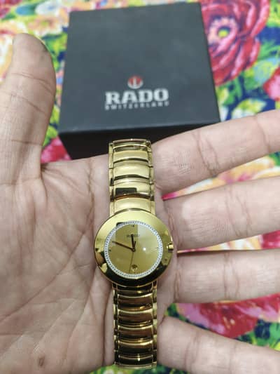 Rado gold wristwatch in flawless condition.