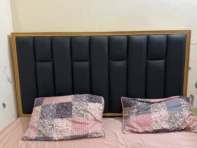 King size bed in good condition with 2 side tables ,without mattress