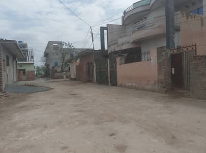 6 Marla corner plot on 30ft road located back side Grand avenue society near Ferozepur road kahna nau Lahore