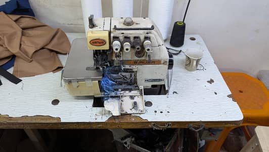 KAJ BUTTON OVERLOCK MACHINE (all three for sale)