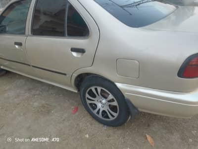Nissan Sunny 2001 betrthen  Corolla gli xli city