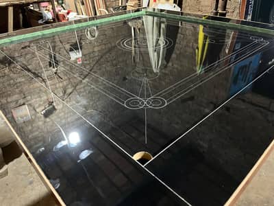 carrom board/ table tennis/ board game / ludo