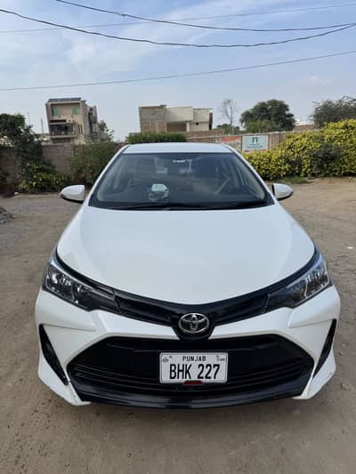 TOYOTA ALTIS 1.6 2021 Model White color Bumper To Bumper genuine