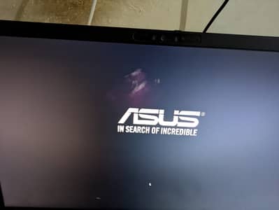 A little purple mark on the screen visible on black screen only