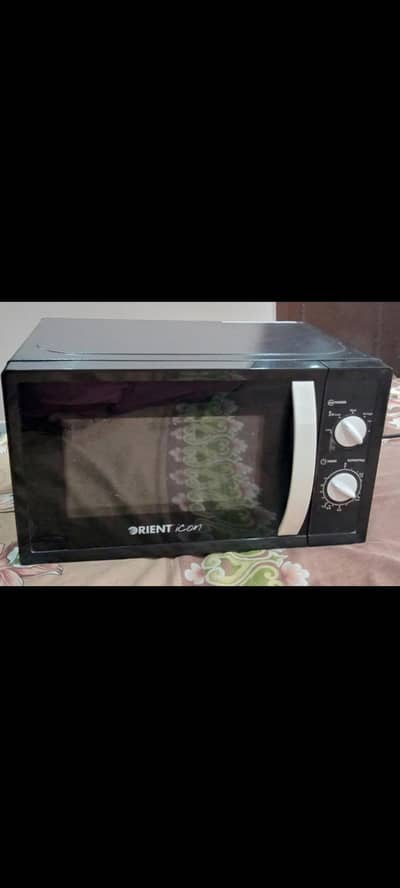 Orient icon Om-720CXNB Microwave oven just like new condition. . 195