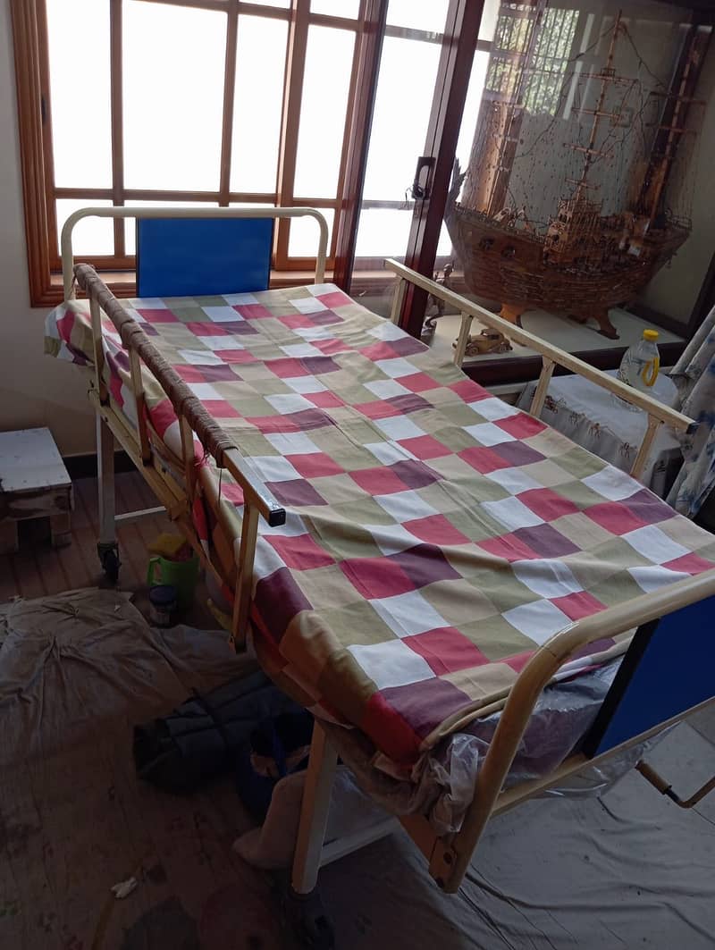 Single mechanical bed + side table 1