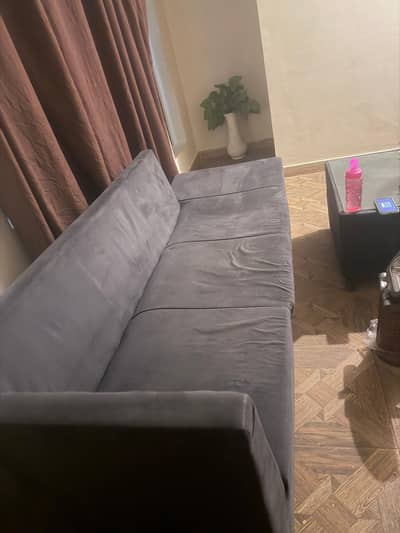 L shape sofa with table