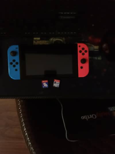 Nintendo switch with two games