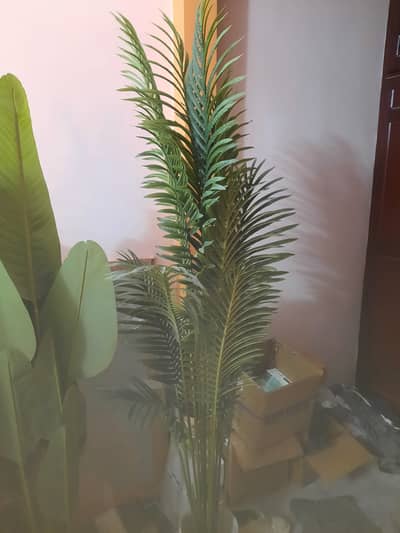 Pots and artificial plants for sale