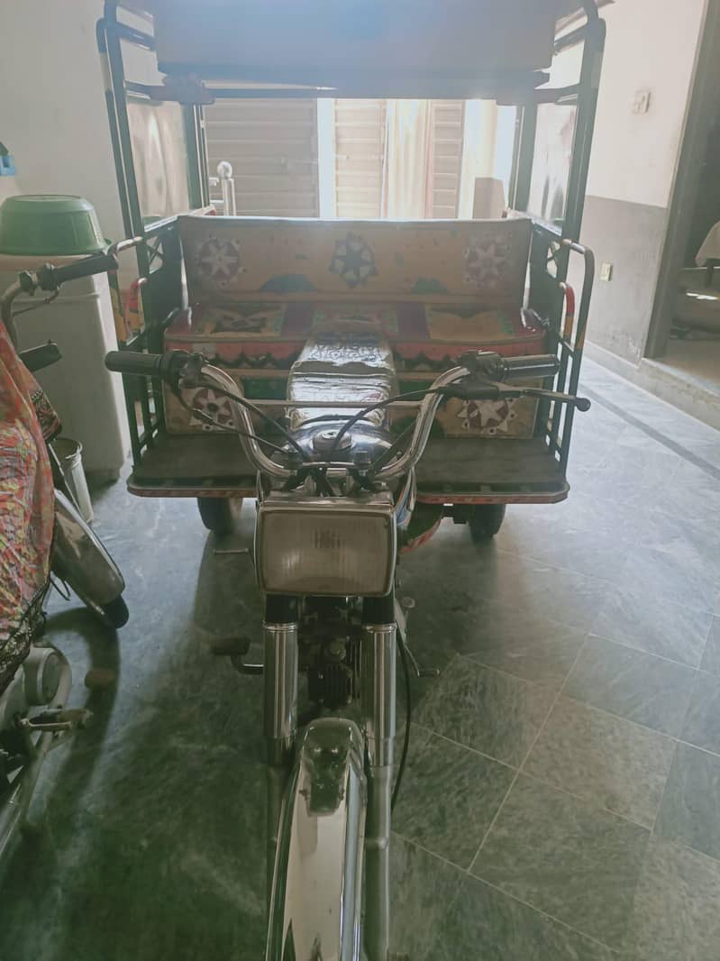 یونائیڈد چنگ چی رکشہ 3