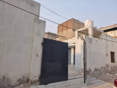 Warehouse Officer Colony No 2 Society Boundary Wall Madina Town Faisalabad