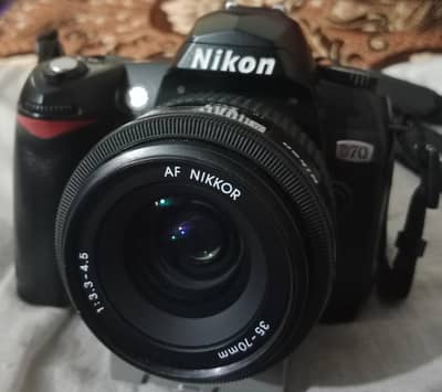 Nikon D70 DSLR Camera with AF Nikkor 35-70mm Lens.