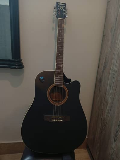 full sized matte black guitar