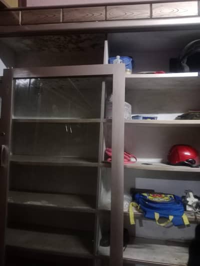 Sofa Set with their covers and large size Showcase.