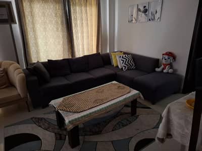 Grey L shaped sofa for sale
