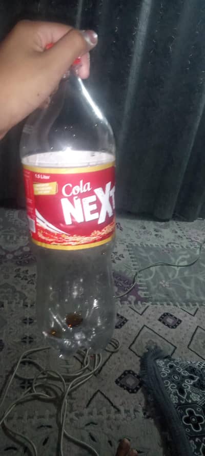 Water bottle , next cola or cola next