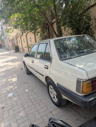 White Nissan Sunny 1985 | Home used car |