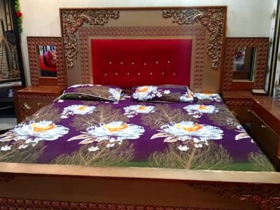 King size bed with darsseng table with side table with meters