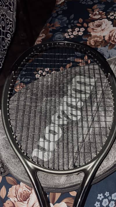 The Yonex EZONE 100 tennis racquet (latest generations)