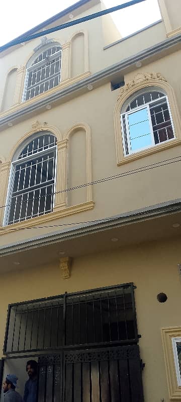 2.5 Marla triple story brand new in Neelam block opp Iqbal town Lahore
