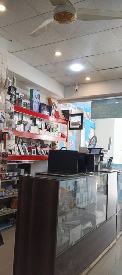 running mobiles and  laptops  shop available for sale at DHA 2 Islamad