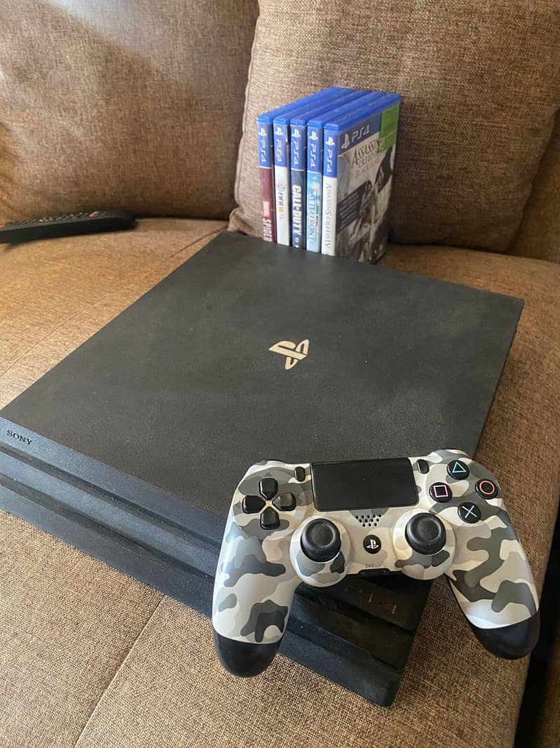 PS4 Pro 1TB with controller 1