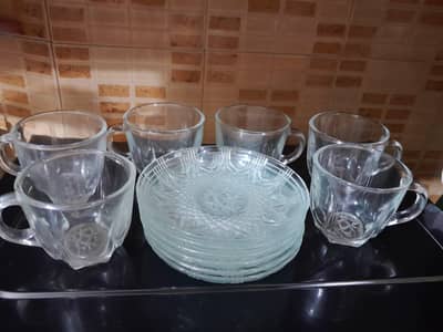 Beautiful glass made cups and its plates.