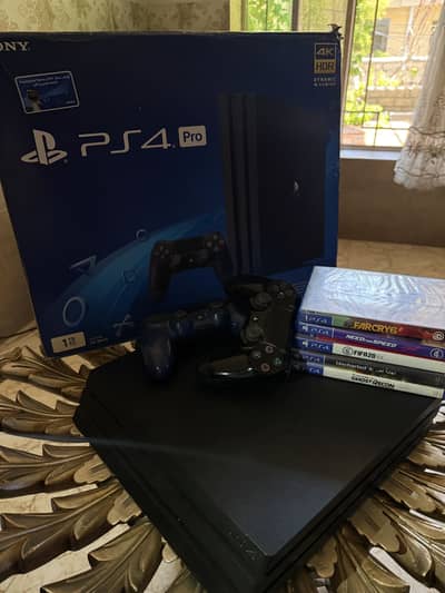 PS4 Pro 1TB + 2 Controllers + 5 Games | Excellent Condition